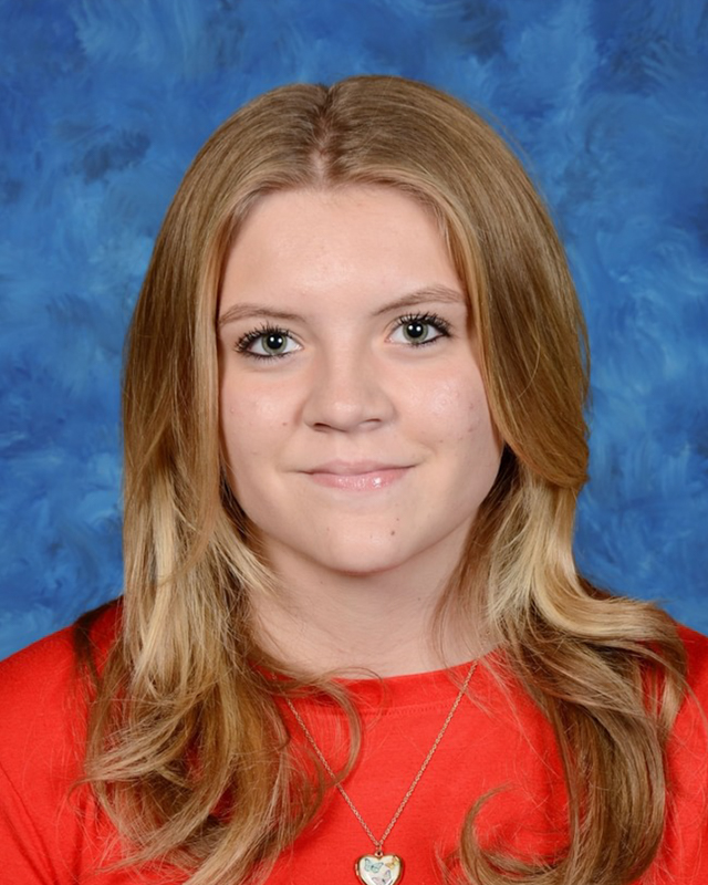 picture of a young girl with blonde hair smiling